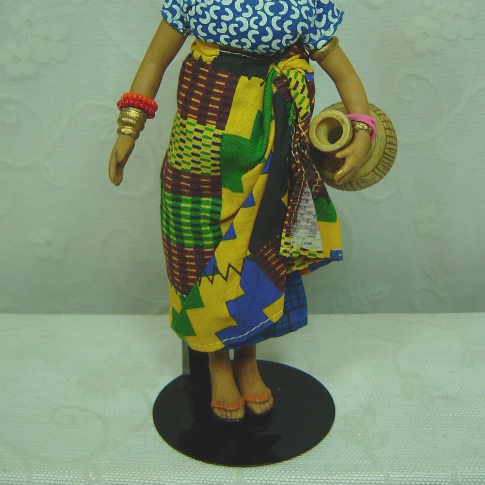 8" porcelain doll--dark skinned native woman carrying water jug - Picture 2 of 7